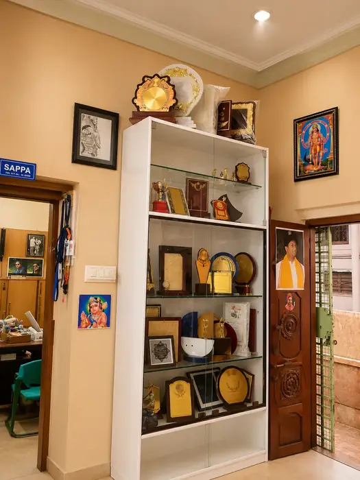 Photo frames and awards display inside Sri Sai Photo Laminations